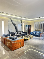 Canapé d'angle de style italien haut de gamme en acier inoxydable, léger, modulaire de luxe pour plusieurs personnes, ensemble de salon pour villa