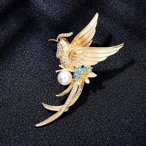 Broche de Ave del Paraíso Clásica, Pájaro Fénix Dorado, Pin Mate con Imitación de Perla, Regalo Unisex - Product Image 1