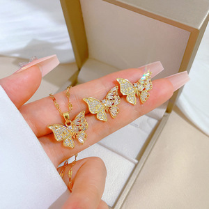 Vente en gros de bijoux pour femmes plaqués or 18 carats, colliers et boucles d'oreilles, ensemble de bijoux tendance en acier inoxydable pour femmes - Product Image 2