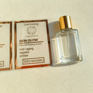 สติกเกอร์และฉลากใสพิมพ์ลายแบบกำหนดเองสำหรับติดกระป๋องเครื่องสำอางแบบกันน้ำเคลือบฟอยล์ทอง - Product Image 1