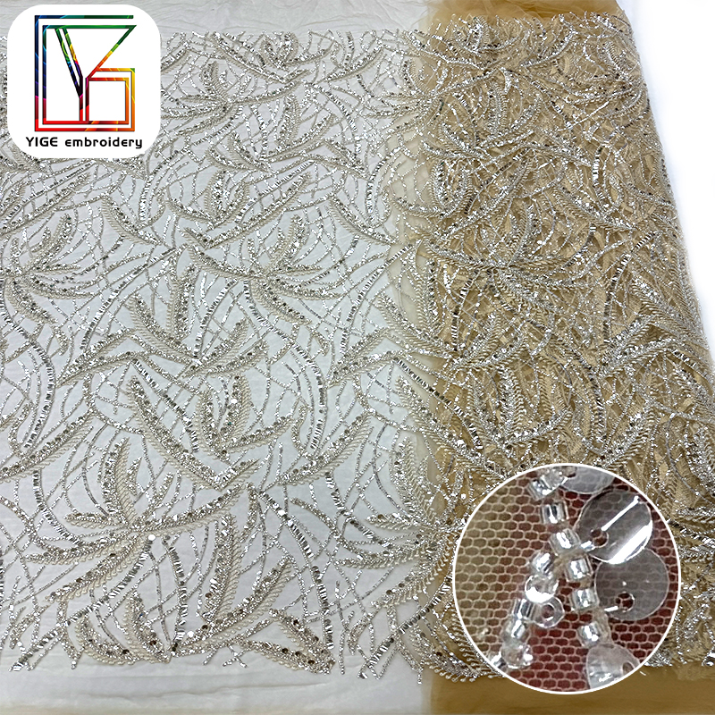 Bare mesh fabric paired with silver beads