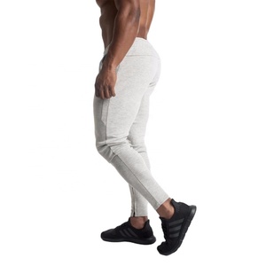 กางเกงวอร์มผู้ชายทรงสลิมฟิต คุณภาพสูง ขายดี รุ่นใหม่ สำหรับออกกำลังกาย ฟิตเนส วิ่งจ๊อกกิ้ง เอวยางยืด เหมาะสำหรับฤดูใบไม้ผลิ - Product Image 3