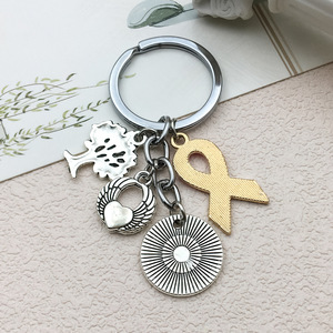 Porte-clés <span class=keywords><strong>en</strong></span> métal créatif avec ruban <span class=keywords><strong>rose</strong></span> pour <span class=keywords><strong>la</strong></span> sensibilisation au cancer du sein ailes d'arbre de <span class=keywords><strong>vie</strong></span> amour n'abandonnez jamais porte-clés sac pendentif porte-clés - Product Image 3