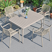 Table à manger d'extérieur moderne en teck massif avec cadre en alliage d'aluminium, durable, imperméable et résistante aux UV, pour plage, parc, hôtel, villa