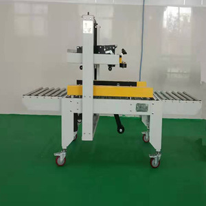 Machine de scellage automatique de boîtes, scelleuse de cartons à charge lourde pour les petites boîtes de produits chimiques industriels - Product Image 2