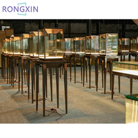 Kiosque de magasin de détail personnalisé, présentoir de bijoux professionnel, métal doré, vitrine de bijoux en verre avec lumière LED