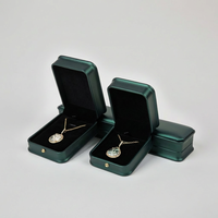 Boîte à bijoux en cuir PU vert foncé Zebo Wholesale avec logo personnalisé, bouton doré, intérieur en velours doux
