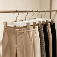 Cintre professionnel robuste antidérapant pour pantalons avec clips métalliques résistants à la rouille, idéal pour organiser pantalons, jupes et jeans