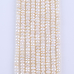 Vente en gros de perles de culture d'eau douce naturelles plates blanches de 18 cm 5-6 mm pour collier ou bracelet DIY - Product Image 1