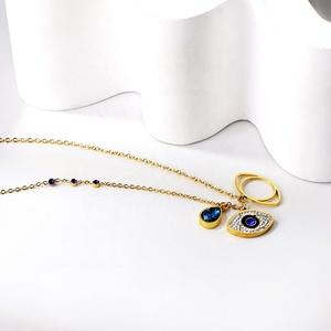 Collar con Colgante de Acero Inoxidable Chapado en Oro de 18K con Diseño de Ojos Azules en Forma de Cruz de Tres Capas Estilo Bohemia Vintage, Regalo Unisex - Product Image 4
