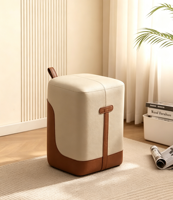 Pouf carré moderne bicolore en similicuir rembourré, repose-pieds inclinable et souple avec poignée de transport, portable pour salon et chambre