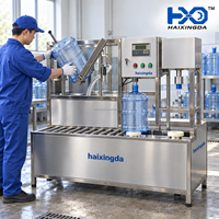 Machine semi-automatique 3-en-1 industrielle de lavage, remplissage et bouchage de bouteilles de 5 gallons pour ateliers d'eau en fût et usines de purification