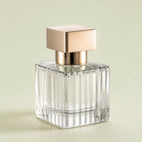 Vente en gros usine – Flacon vaporisateur de parfum irrégulier 40 ml, forme unique, en verre, avec capuchon doré, pompe pulvérisatrice, givré, estampage à chaud, sérigraphie