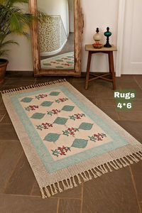 Tapis en coton imprimé floral Buti 5x8 fait main avec pompons, tapis de sol bohème pour salon et chambre à coucher - Product Image 3