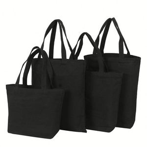 Sac fourre-tout en toile de coton noir réutilisable, écologique, pliable, à bandoulière, pour le marché - Product Image 1