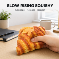 Jouet Squishy Croissant avec design brillant, morceaux de noix croquants et motif salé, anti-stress, se repulpe après pressage, décoration de bureau