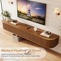 Meuble TV flottant personnalisé en noyer, style Mid-Century, avec portes rabattables sans poignée et bords arrondis pour salon