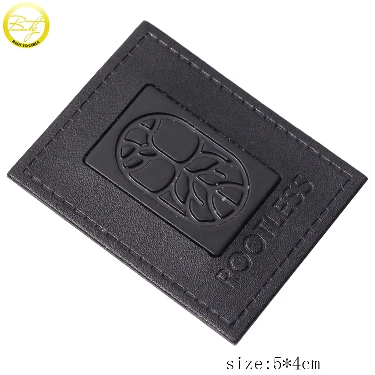 Borse patch in pelle goffrata con logo nero opaco personalizzato cucito etichetta in pelle pu per uomo jeans