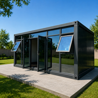 Bâtiment modulaire préfabriqué à assemblage rapide avec façade transparente, utilisable comme bureau, salle de réunion portable, salle d'exposition mobile, studio ou pièce de réception