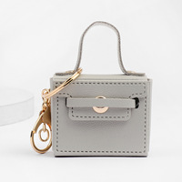 Mini sac à main de luxe pour filles, porte-clés, pendentif, porte-clés de voiture, porte-monnaie de créateur, étui universel pour écouteurs