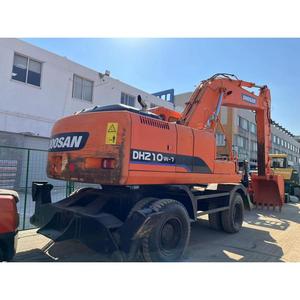 Excavatrice sur pneus d'occasion DOOSAN DH210W de 21 tonnes, à réponse rapide, conception économe en énergie, pour travaux de réparation routière urbaine et excavations - Product Image 2