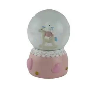 Hand painted Custom Polyresin snow globe, Resin water globes, Rabbit on hobbyhorse glass ball Factory