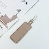 Porte-clés en cuir de litchi, étui portable pour rouge à lèvres, pochette de rangement personnalisable avec logo pour baume à lèvres, à suspendre au sac