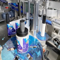 Machine d'étiquetage adhésive double face à grande vitesse pour bouteilles en plastique