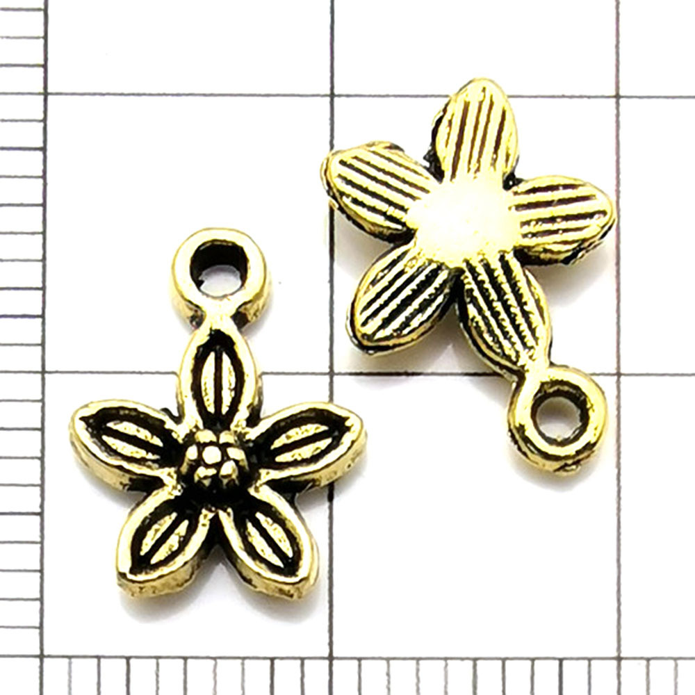1 morceau de *Fleur d'Or* - 0,5g - 13*10mm - 11080
