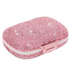 กล่องเก็บยาพลาสติกสีชมพูสดใส พร้อมกล่องใส่ยาแบบพกพาสะดวก - Product Image 1