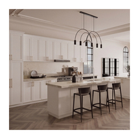 Meuble de cuisine blanc laqué de style transitionnel avec îlot central et tiroir profond pour propriétés locatives