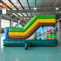 Château gonflable Ceyu avec imprimé Monde des Blocs et toboggan jaune pour location de fêtes d'enfants