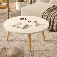 Table basse de luxe ronde minimaliste moderne portable à usage domestique avec cadre en acier et plateau en bois pour le salon