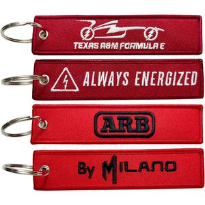 Custom Logo Embroidered Keychain Woven Jet Flight Tag Fabric Business-Targeted Keyholder with Anime Design - Product Image 1