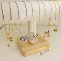 Bague unisexe en acier inoxydable plaqué or 18 carats avec chiffres romains émaillés noirs et zirconiums cubiques taillés, bijou tendance pour femme, idéal pour les cadeaux.