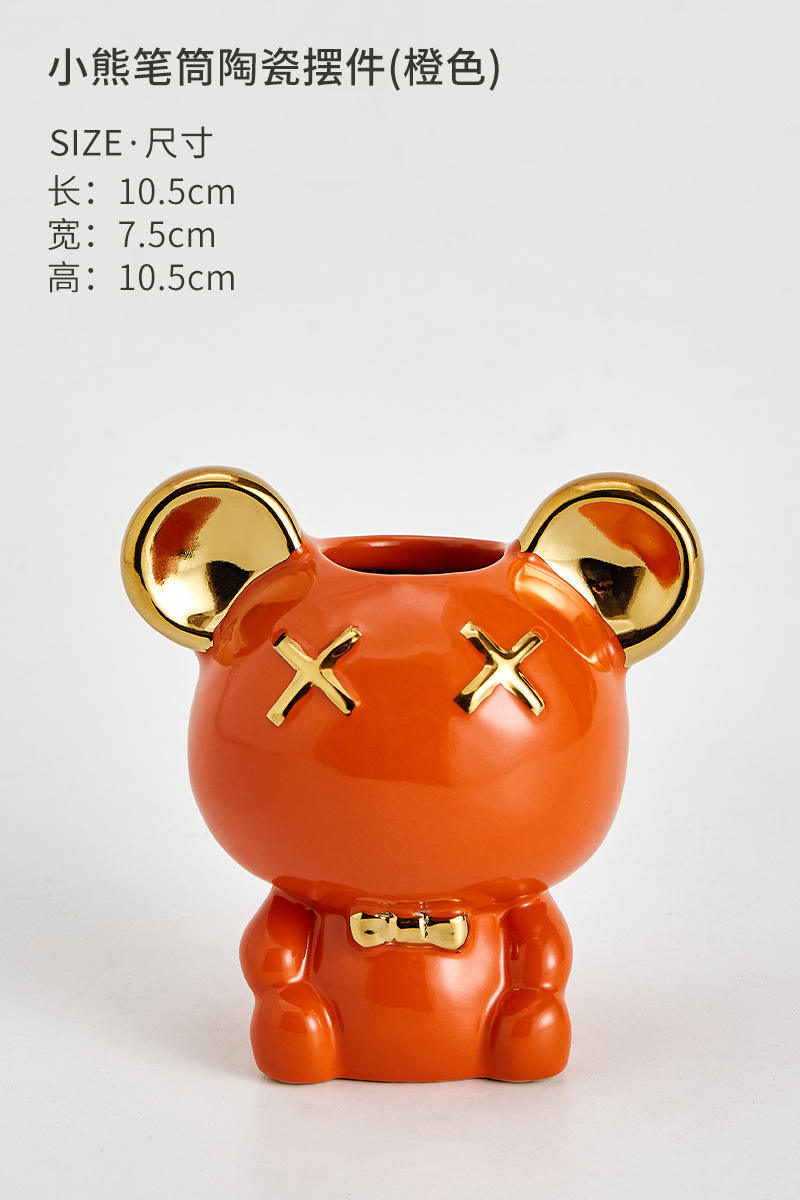 Porte-stylo en or orange