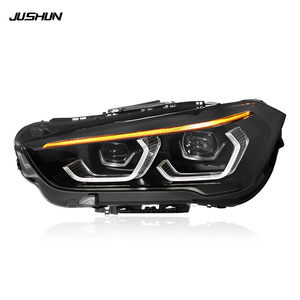 Conjunto de faros Jushun F49 para BMW X1 2016-2019 con luces LED DRL y señal de giro mejoradas - Product Image 1