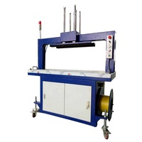 Machine à sangler et à emballer, pour emballage de boîte carton