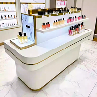 Vitrine de présentation de parfums et cosmétiques de luxe moderne, écologique, en acier inoxydable de haute qualité, taille et couleur personnalisées, éclairage LED, pour la vente au détail