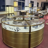 Présentoirs à bijoux de luxe avec cadre doré incurvé, vitrine LED en verre trempé pour boutique de bijoux, centre commercial, magasin de détail