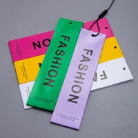 Vêtement fantaisie multicolore imperméable personnalisé en caoutchouc souple PVC translucide impression d'étiquette étiquette volante avec ficelle de logo pour vêtement