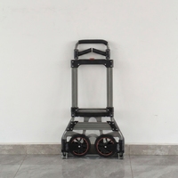 Chariot en alliage d'aluminium argenté avec bouton rouge, design rétractable