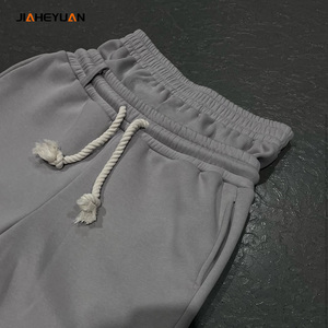 Pantalones holgados de pierna ancha en blanco de alta calidad con cordón para hombre, pantalones de chándal de cintura alta apilados de gran tamaño para hombre - Product Image 1