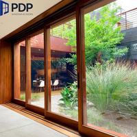 Portes coulissantes en verre translucide coupe-vent en bois recouvert d'aluminium haute performance, finies pour une utilisation en chambre, hall, sous-sol, extérieur