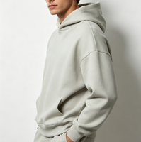 Sweat-shirt surdimensionné à capuche pour homme, style streetwear vintage, design personnalisé avec logo sur le devant, tissu en coton 100% éponge, respectueux de l'environnement