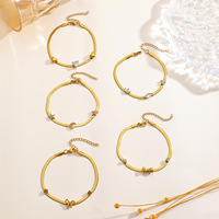 Bracelet tendance en acier inoxydable avec chaîne à maillons serpent, breloques en forme de fleur, cœur doré, nœud et zircon, style mignon, mode minimaliste