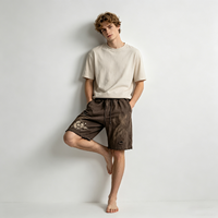Shorts en vinyle marron imprimé, finition délavée à l'acide, texture effet soleil, toucher doux, vêtement décontracté, prix direct usine, faible MOQ, support dropshipping