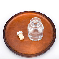 Vente en gros échantillon gratuit Flacon rond en verre vide de 50ml 100ml 150ml 200ml pour diffuseur de parfum avec bouchon en liège