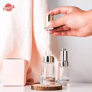 Luxury Customized Clear 30ml Press Pump Cosmetic Essential Oil Serum Glass Dropper Bottle With Logo Box Packaging