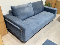 Repose-pieds simple réglable, cadre métallique mobile à roulettes silencieuses, tissu texturé bleu foncé résistant aux taches et anti-décoloration, rembourré